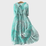 Türkises Kleid mit Schildkrötenmotiv