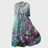 Türkisfarbenes Blütenkleid mit Farbverlauf