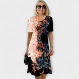 Barbara - Robe noire et bleue à motif floral estival