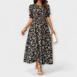 Amelia - Robe rouge col rond à petites fleurs