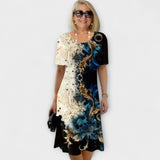 Barbara - Robe noire et bleue à motif floral estival