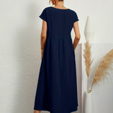 Clara | Robe Midi Fluide à Poches