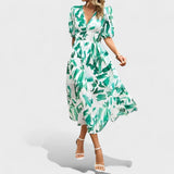 Clara - Robe midi bleue à motif floral