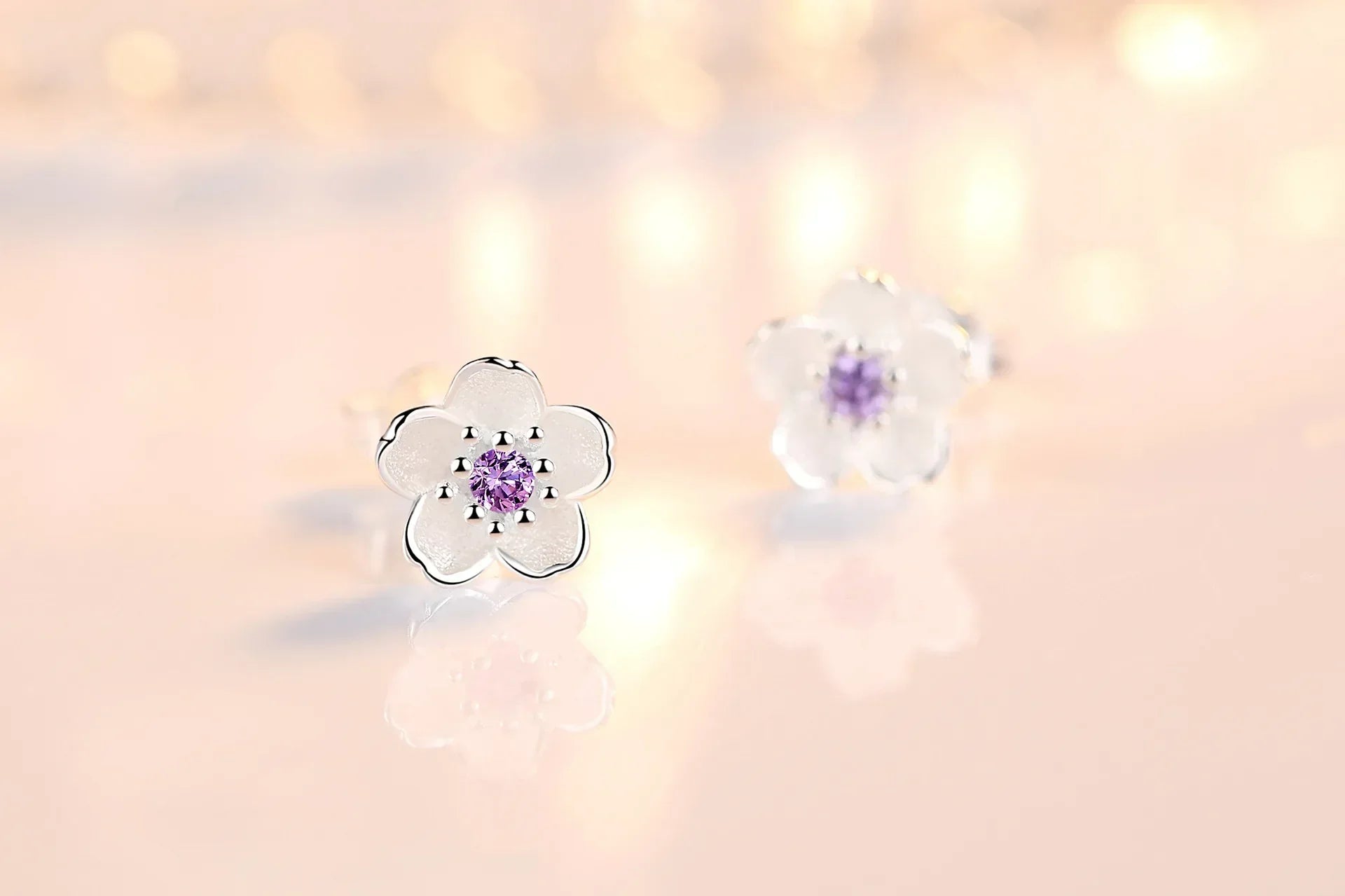 Boucles d'oreilles à bouton en forme de fleur avec zirconiums