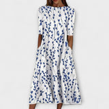 Adelina - Robe blanche à motif floral bleu