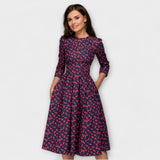 Retrozo - Cremefarbenes knielanges Kleid mit Blüten