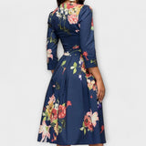 Retrozo - Cremefarbenes knielanges Kleid mit Blüten
