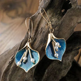 Boucles d'Oreilles Pendantes en Or et Bleu avec Perles