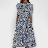 Adelina - Robe blanche à motif floral bleu